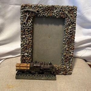 New  , yet made in 1999 beautifully hand crafted of pebbles n metals. 4”-6”